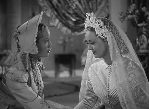 Bette Davis e Miriam Hopkins in Il grande amore, 1939